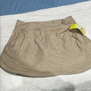 All in motion beige skort.